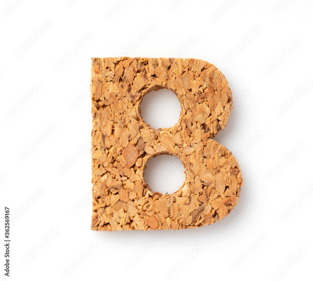 The letter “B on the cork on a white background