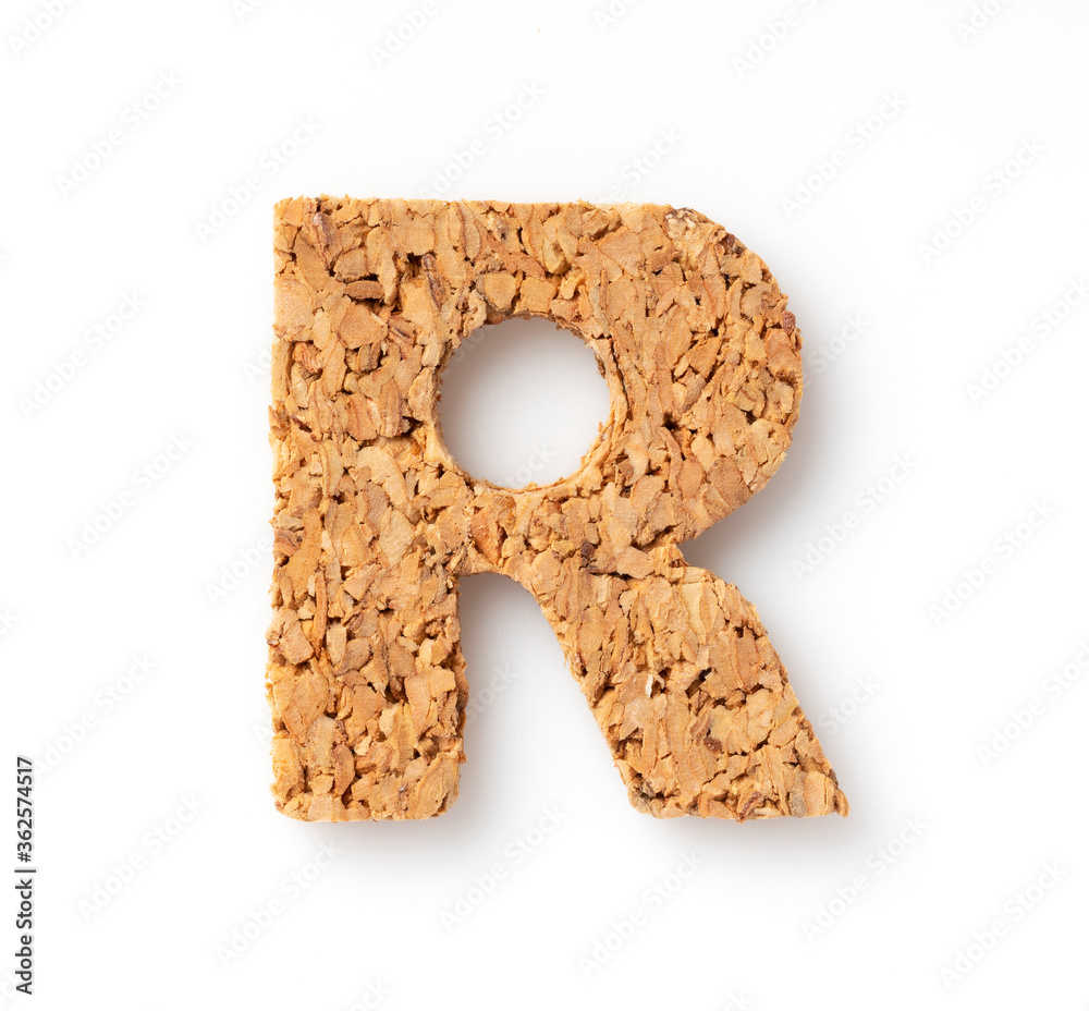 The letter “R on the cork on a white background