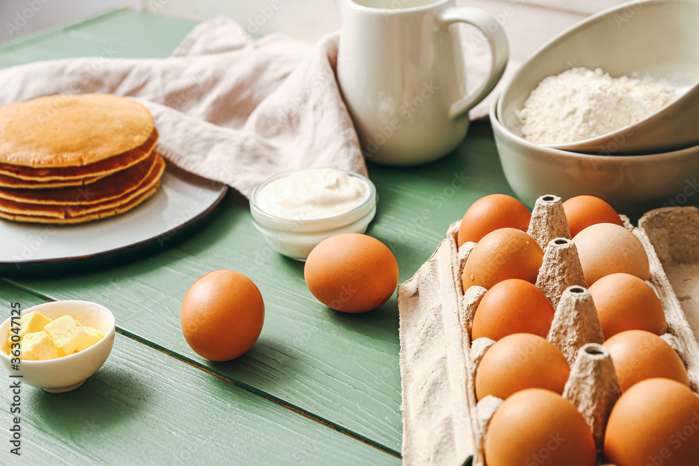 Ingredients for pancakes on table