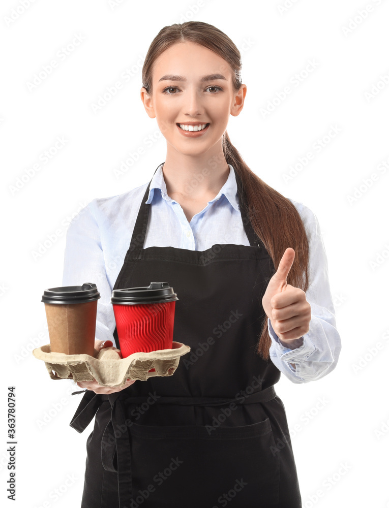 Young female barista on white background