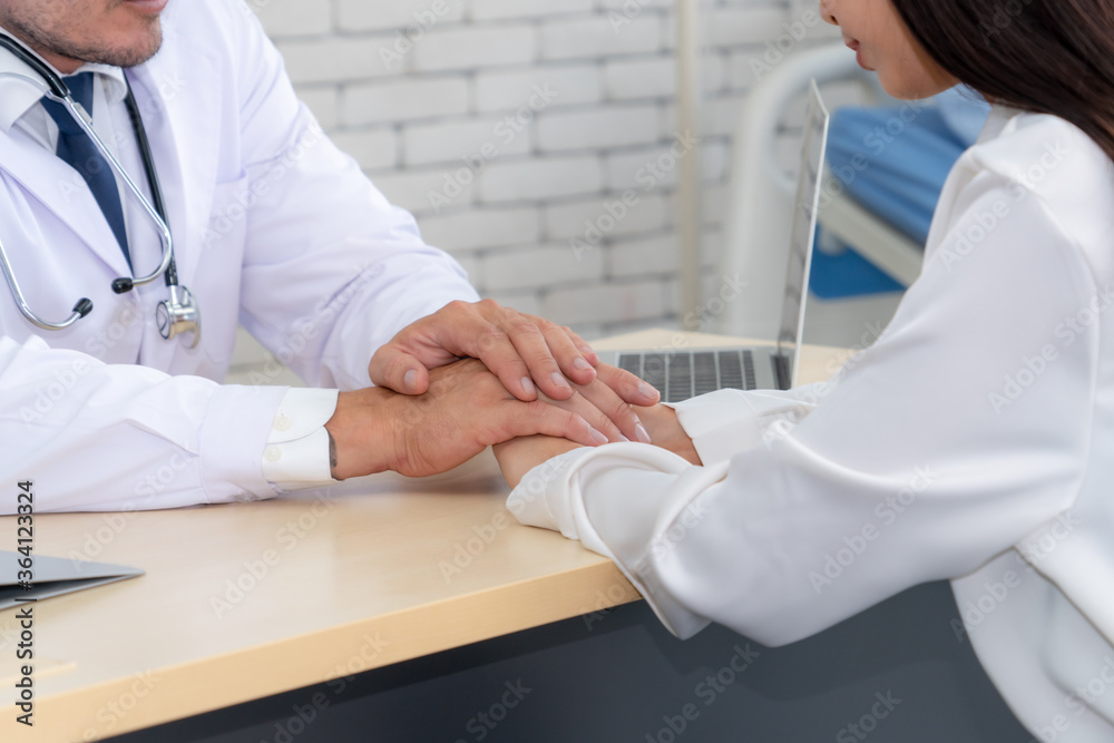 Doctor in professional uniform examining patient at hospital or medical clinic. Health care , medica