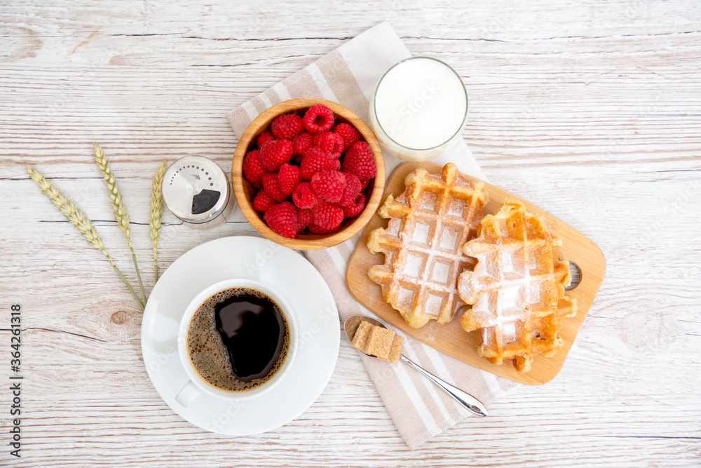 Breakfast in the morning with black coffee cup with bread with Croissant and fruit on the wooden tab