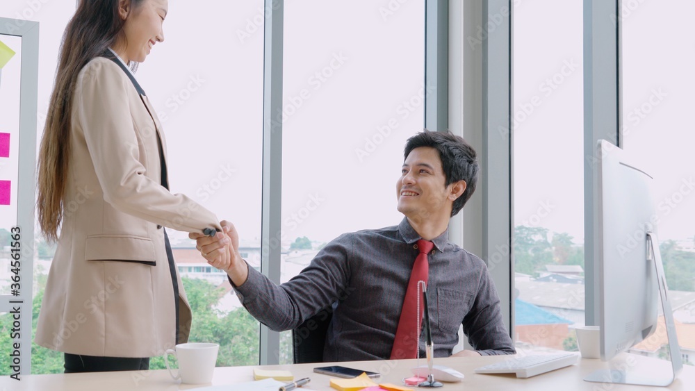 Two business people talk project strategy at office meeting room. Businessman discuss project planni