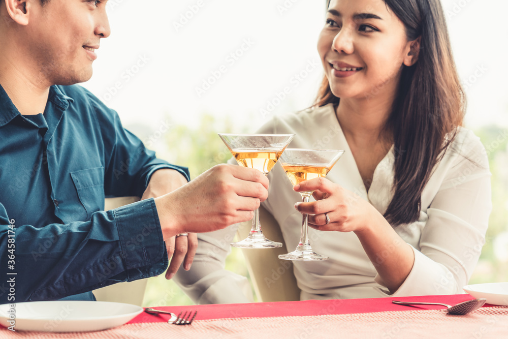 Happy romantic couple eating lunch at restaurant . Couple anniversary celebration and lifestyle .