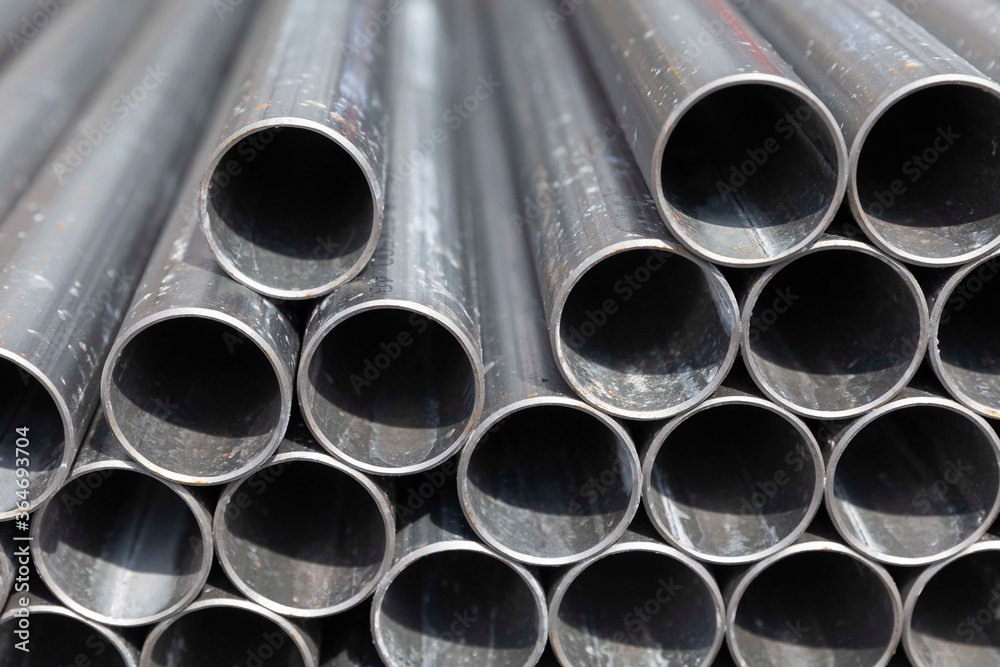 Close - up Stack of construction metal pipes