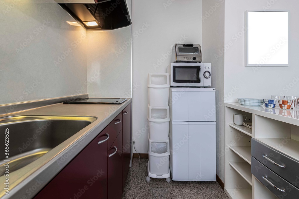 Sink and small kitchen corner in the room At the condominium