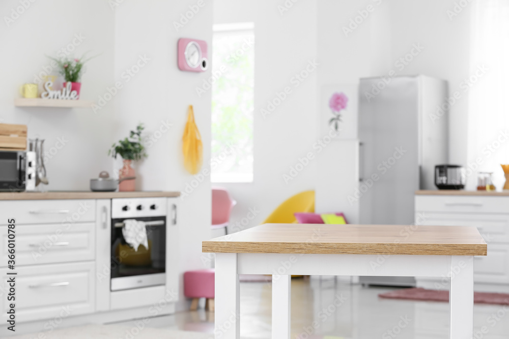 Clean table in interior of modern kitchen