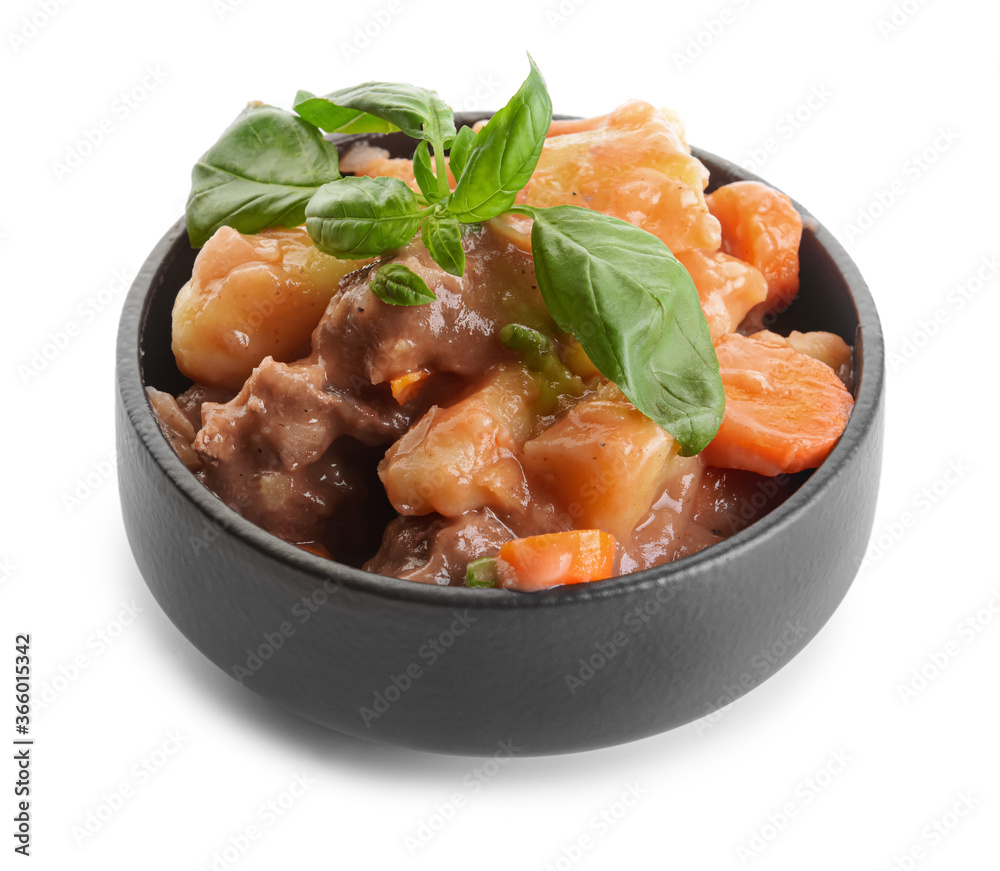 Bowl with tasty beef stew on white background