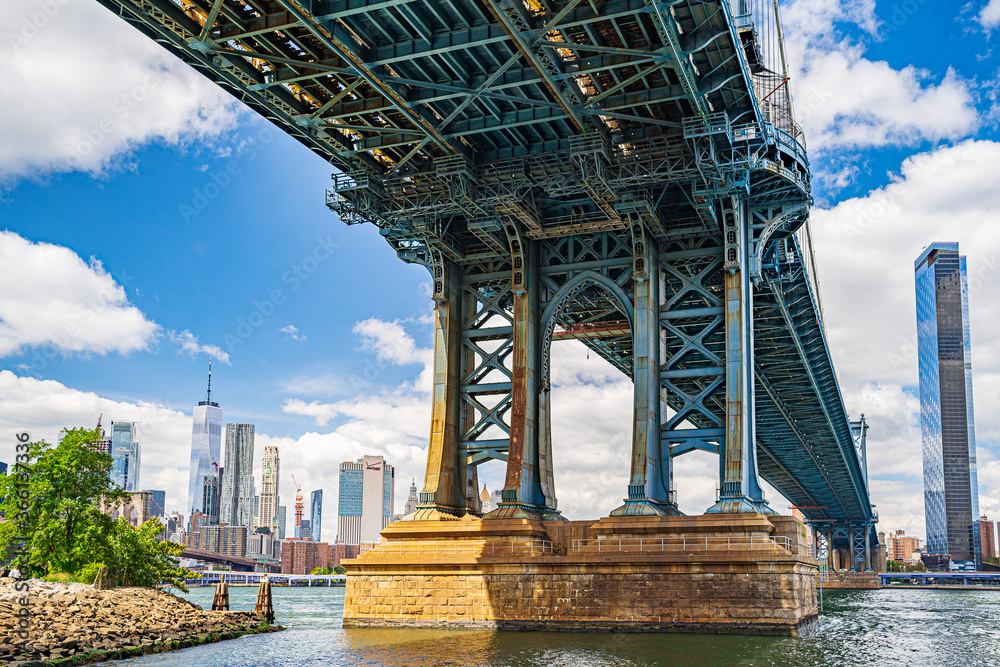 Manhattan Bridge over East River and waterfront condominium Manhattan New York City Wide angle view