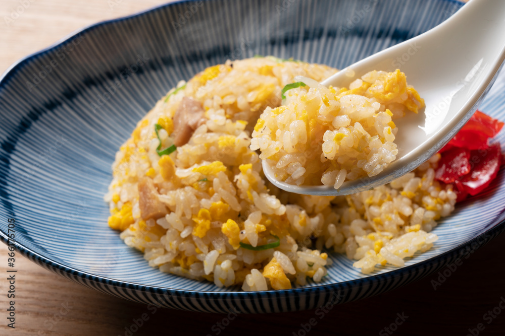 Fried rice in a blue plate.