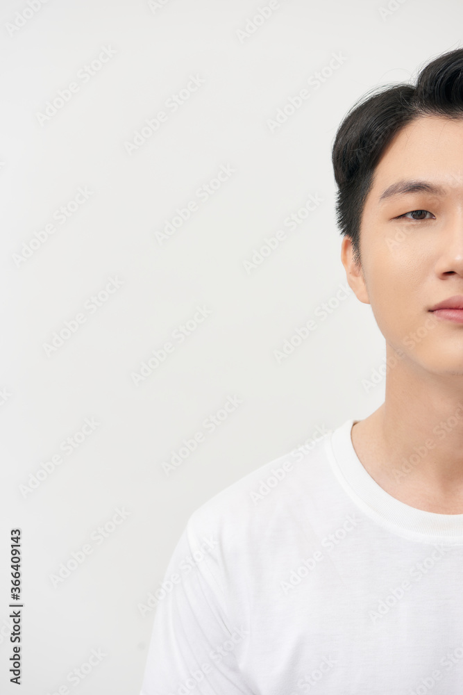 Close-up shot of a part of mans face. Isolated on white background