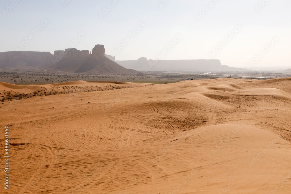 Red sand dunes called Red Sands south of Riyadh. You can see the lanes of quads because the dunes ar