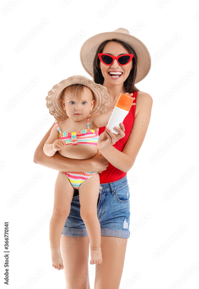 Mother and her little daughter with sunscreen cream on white background