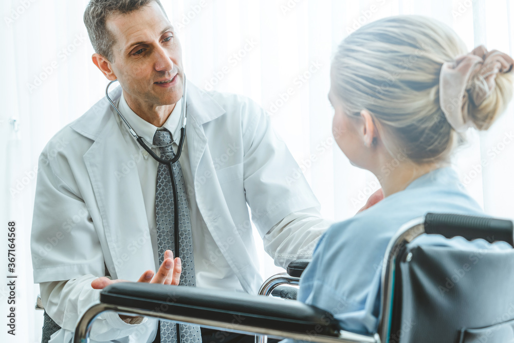 Doctor in professional uniform examining patient at hospital or medical clinic. Health care , medica