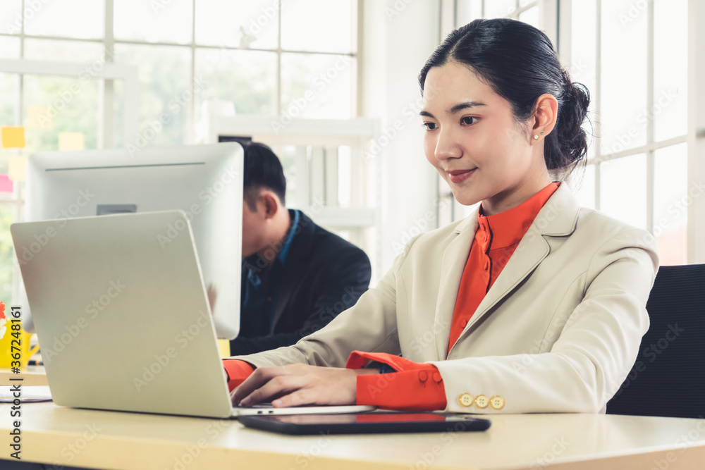 Business people working at table in modern office room while analyzing financial data report .