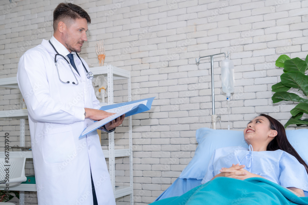 Doctor in professional uniform examining patient at hospital or medical clinic. Health care , medica