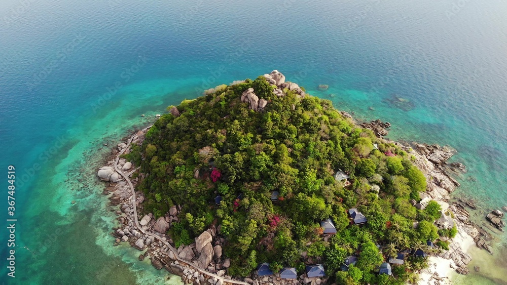 Calm colorful azure turquoise sea near tiny tropical volcanic island Koh Tao, unique small paradise 