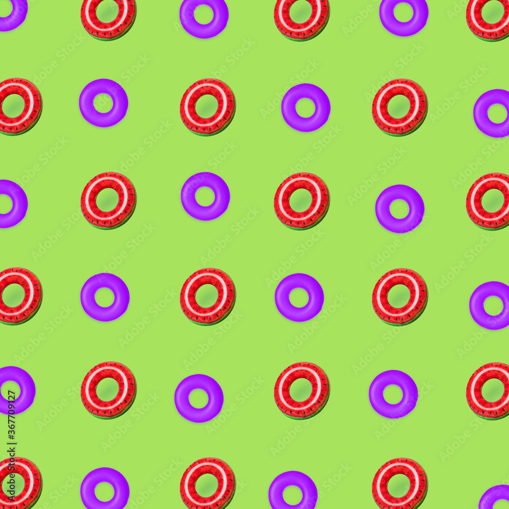 Many inflatable rings on color background