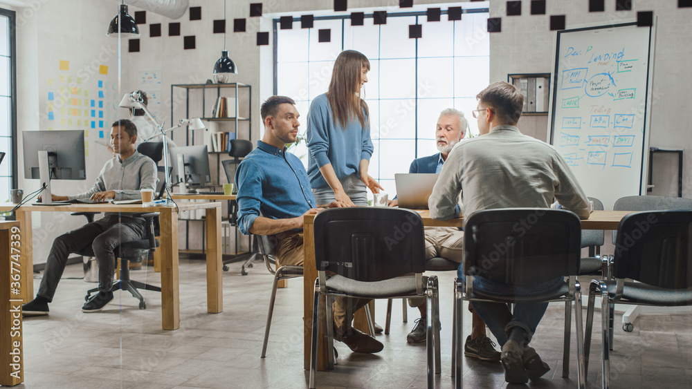 In the Stylish Open Space Office: Diverse Group of Enthusiastic Business Marketing Professionals Use