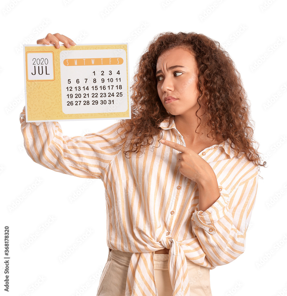 Sad woman with calendar on white background. Vacation concept