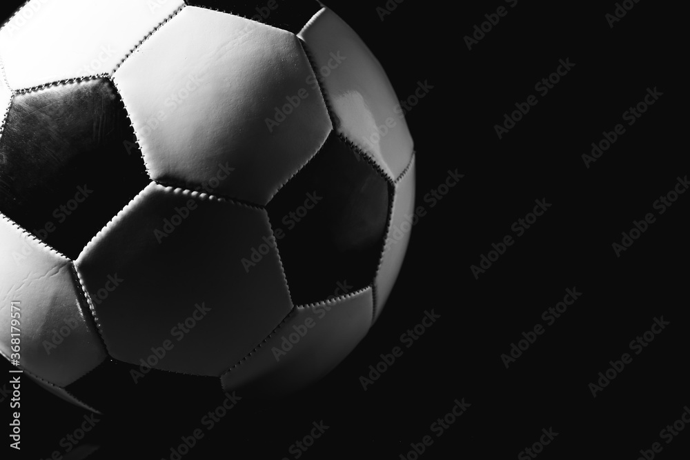 Soccer ball on dark background