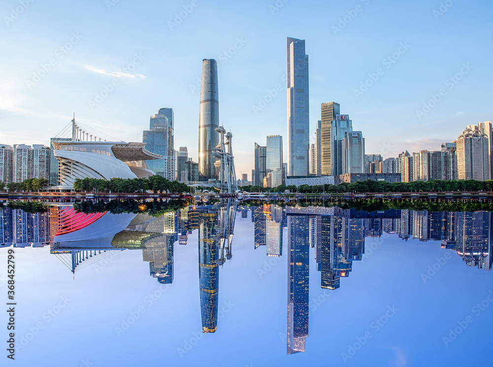 Mirroring scenery of Guangzhou city in day and night, China