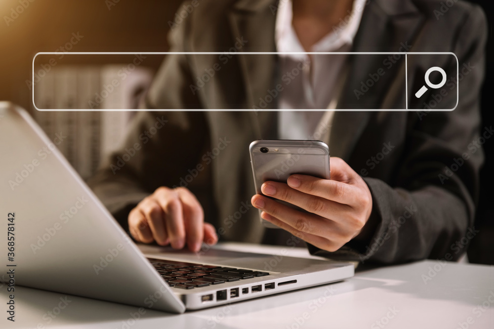 Searching Browsing Internet Data Information with blank search bar.business working with smart phone
