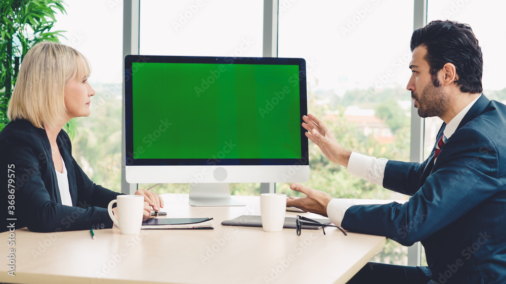 Business people in the conference room with green screen chroma key TV or computer on the office tab