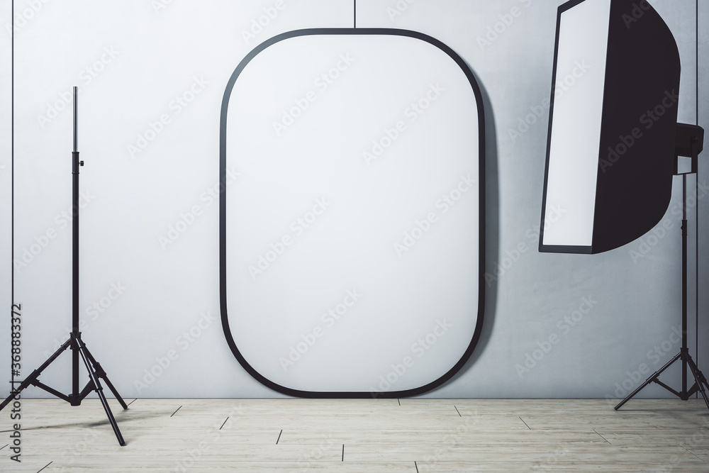 Photo studio interior with whitу background and equipment