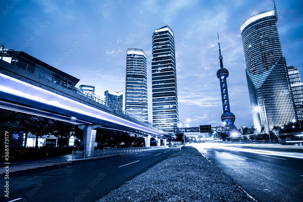 Night view of Lujiazui Financial District Street in Shanghai..