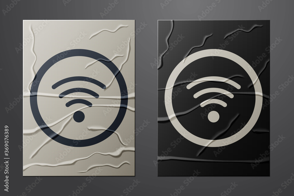 White Wi-Fi wireless internet network symbol icon isolated on crumpled paper background. Paper art s