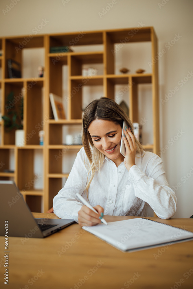 Smiling manager working from home, portrait.