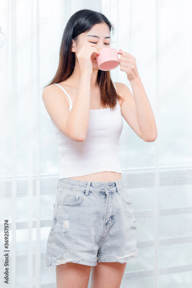 Young girl in the white room