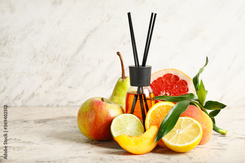 Fruit reed diffuser on table