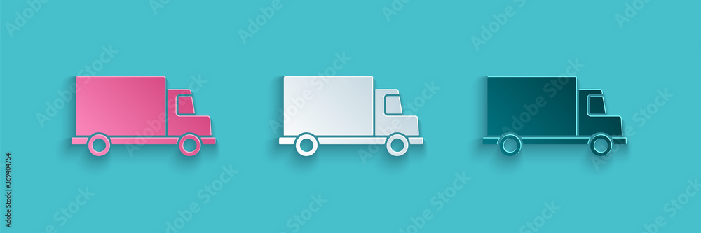 Paper cut Delivery cargo truck vehicle icon isolated on blue background. Paper art style. Vector Ill