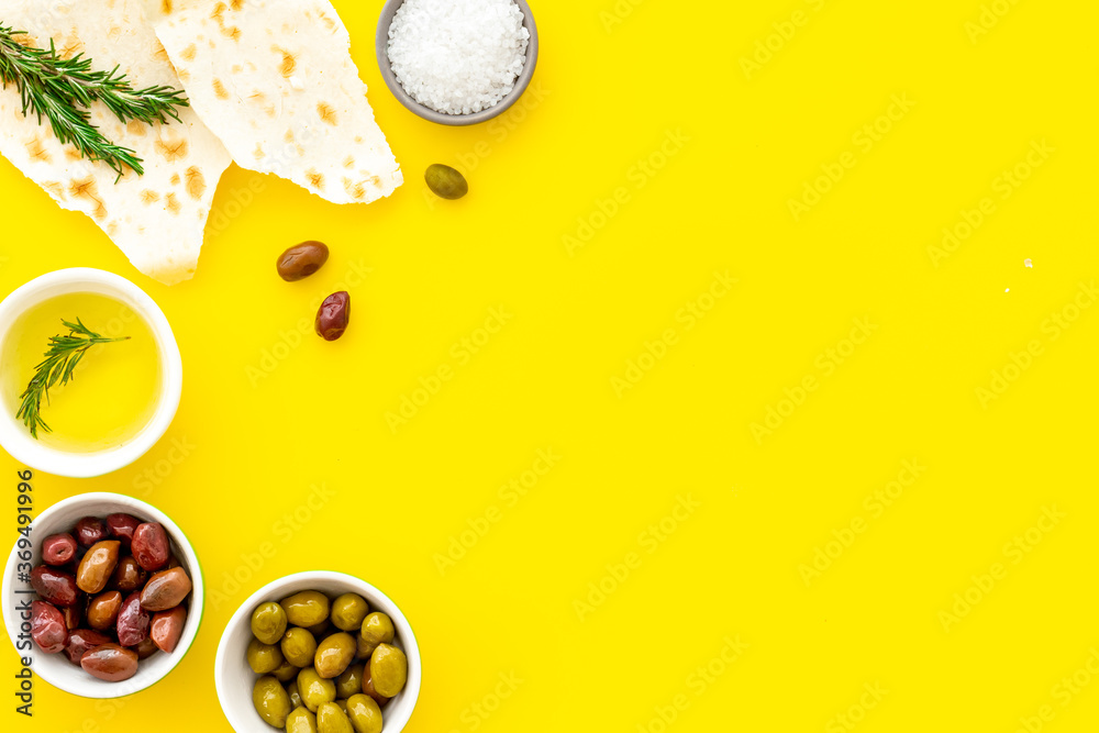 Italian olives, oil, bread - appetizer and snacks - top view copy space