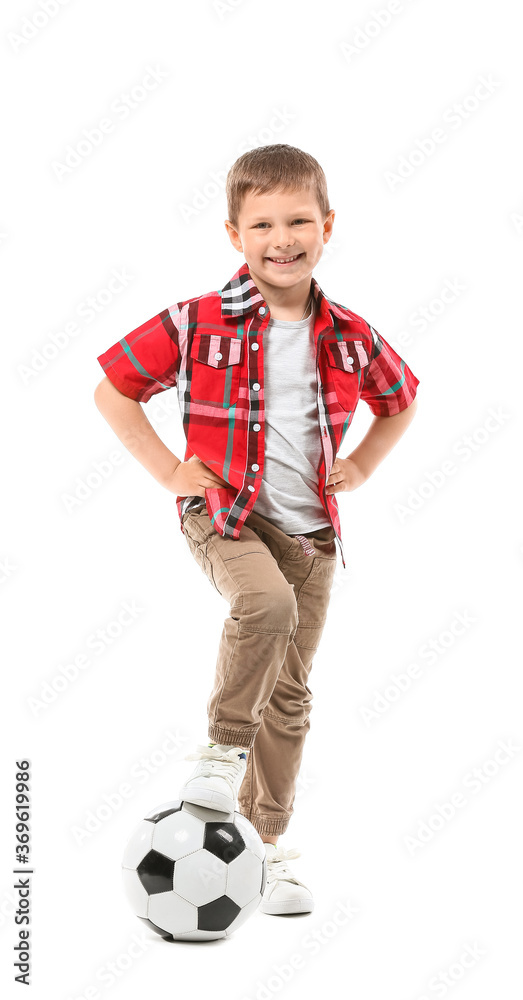 Cute little boy with soccer ball on white background