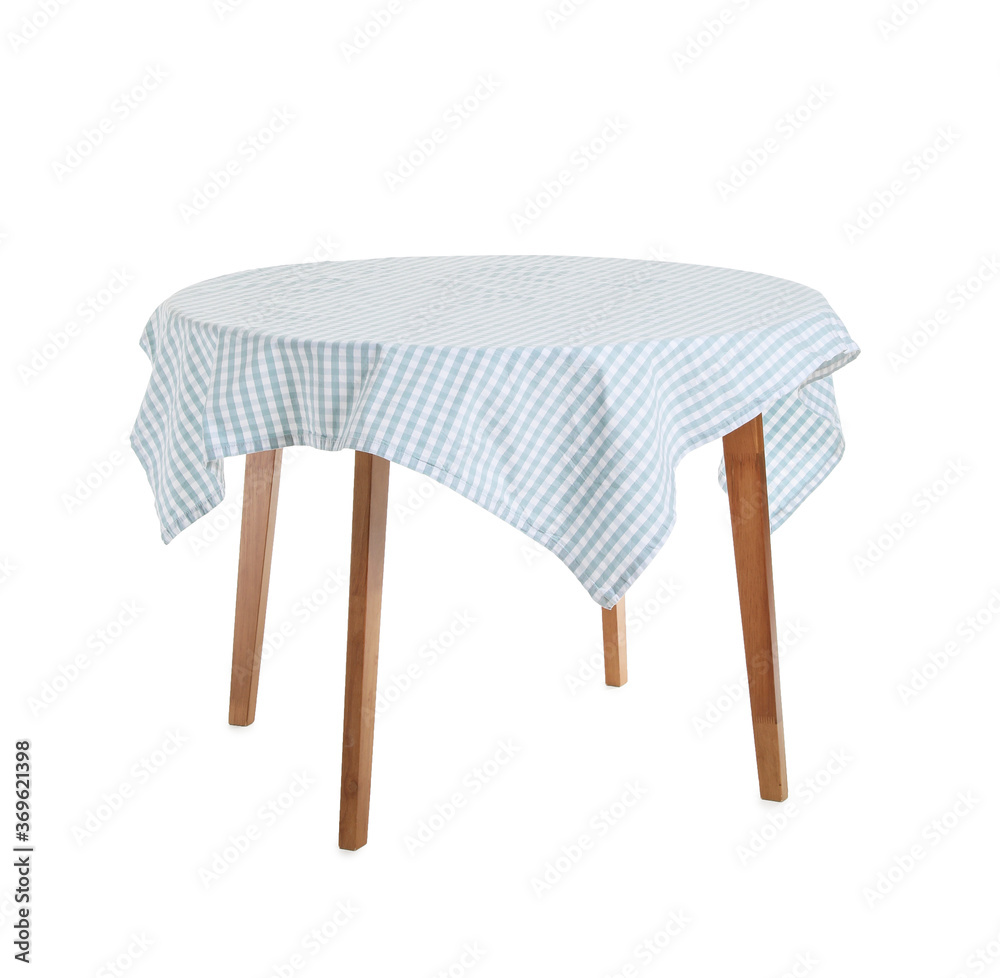 Dining table with tablecloth on white background