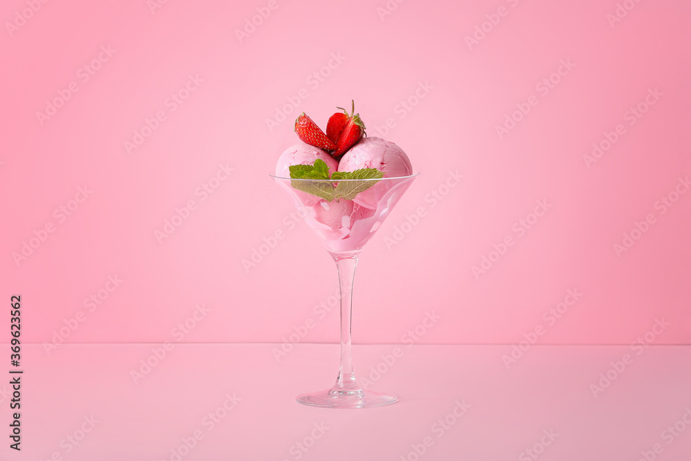 Glass with tasty strawberry ice cream on color background