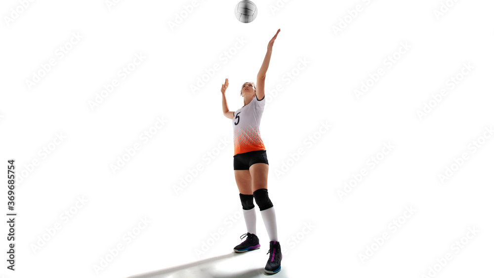 Female professional volleyball players in action on white background.