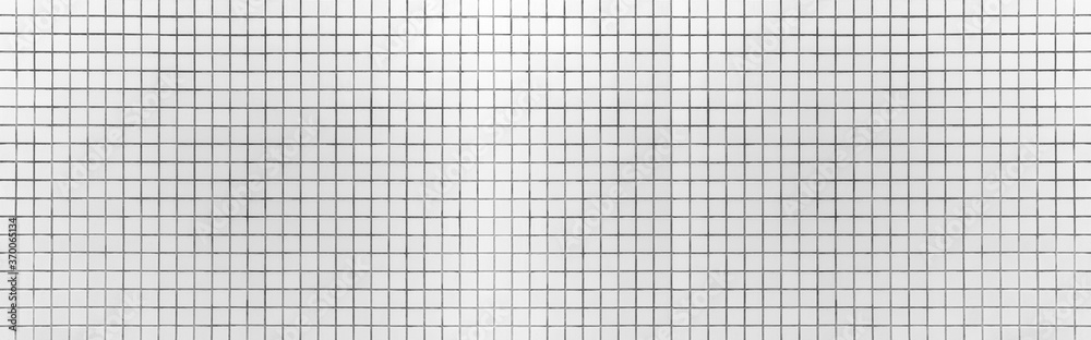 Panorama of white mosaic tile pattern and seamless background