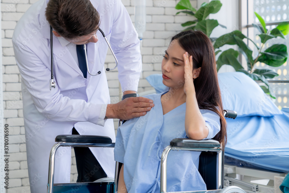 Doctor in professional uniform examining patient at hospital or medical clinic. Health care , medica