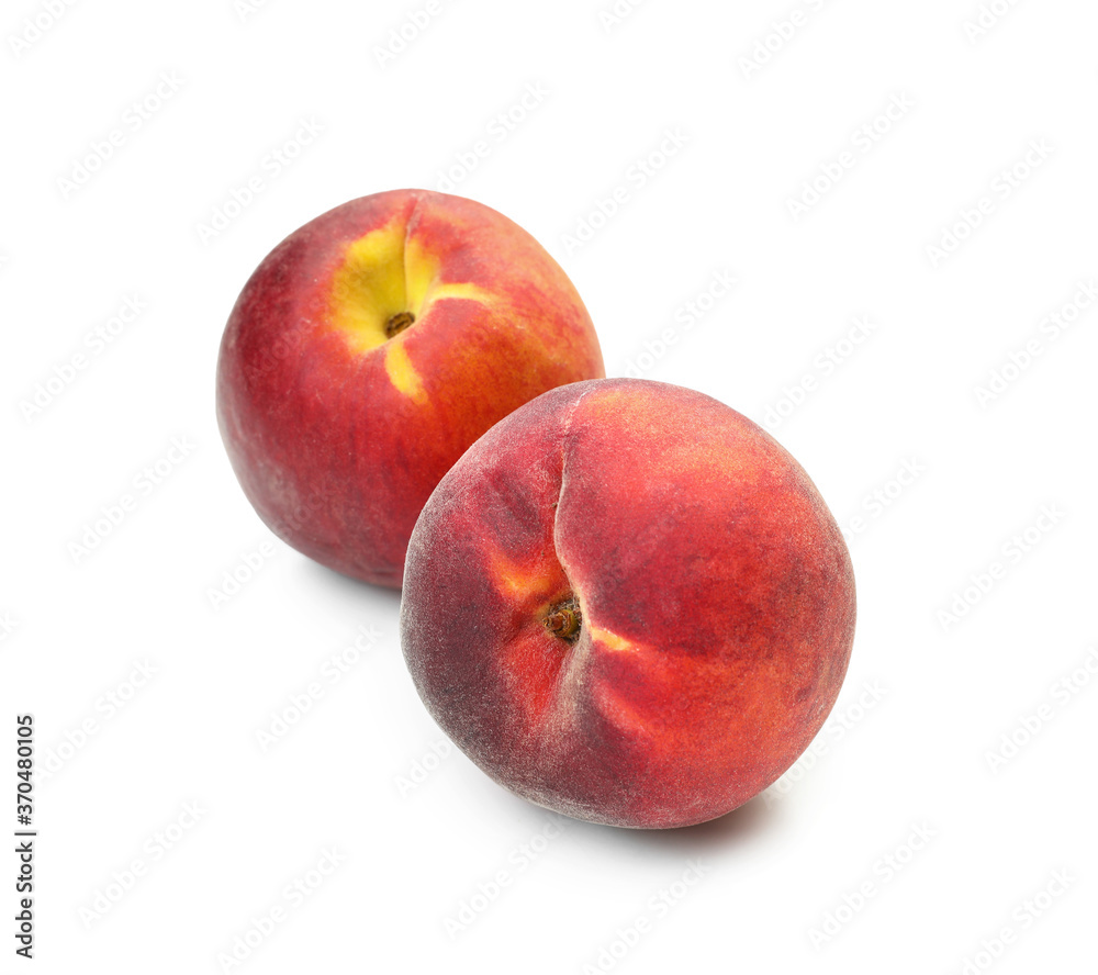 Sweet ripe peaches on white background