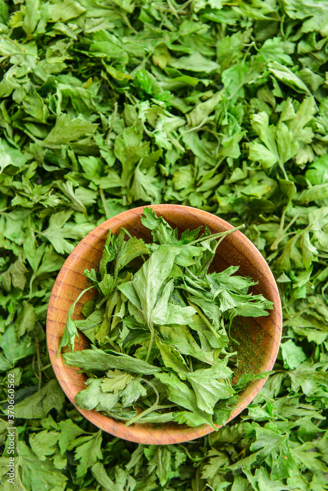 Bowl with heap of dry parsley