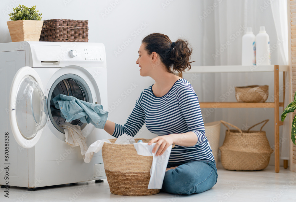 woman is doing laundry