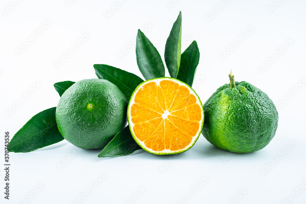 Fresh oranges on white background