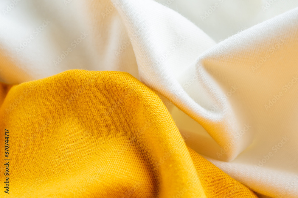 Yellow and white cotton knitted fabric texture