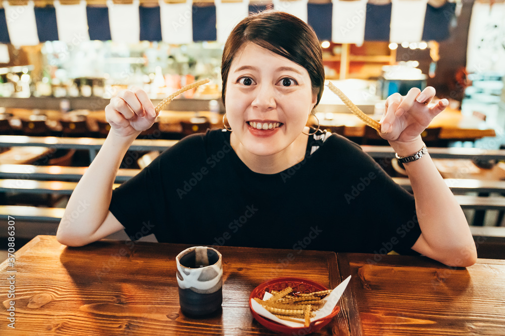 Happy elegant Asian chinese woman smiling portrait face camera joyful. Beautiful lady hands holding 