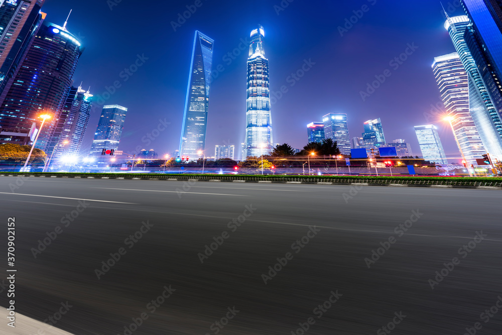 city road through modern buildings in China