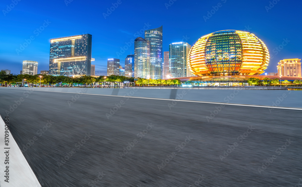 city road through modern buildings in China